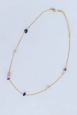 Millie Gold Stone Charm Necklace -Trendy Clothing Store shopdressup beaded necklace 3 01446bce d3d1 4642 9b2a 54a3e7fb5d5a