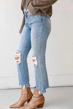 Courtney Light Wash Distressed Kick Flare Jeans -Trendy Clothing Store shopdressup distressed denim jeans 8 eba77d30 0fe3 40df b339 ac1d45087ecf