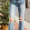 Courtney Light Wash Distressed Kick Flare Jeans Plus -Trendy Clothing Store shopdressup distressed denim jeans 0c6e13c8 9c2a 47c6 a553 a93a650f1df2