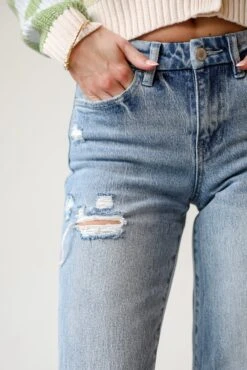 Olivia Medium Wash Distressed Wide Leg Jeans -Trendy Clothing Store shopdressup distressed flare jeans 5 1692d782 1f50 45c0 b3a6 73960fe732a9