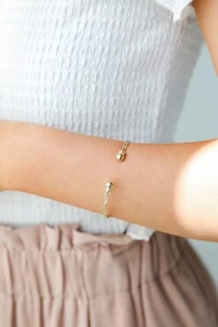 Kate Gold Twisted Cuff Bracelet -Trendy Clothing Store shopdressup gold cuff bracelet 2 002b92d9 8598 45d7 85a4 470051d38561