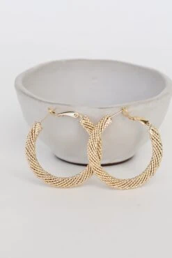 Demi Gold Textured Hoop Earrings -Trendy Clothing Store shopdressup gold hoop earrings 12 b2be392e 2b59 4f60 9e5d 654f4e42cadd