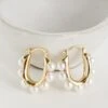 Sara Gold Pearl Oval Hoop Earrings -Trendy Clothing Store shopdressup pearl hoop earrings 2 e192dc90 936c 40f8 8f4a 1de9251a7f4e